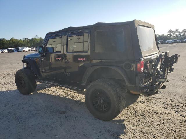 1J4BA3H1XBL506449 - 2011 JEEP WRANGLER U SPORT أسود صورة 2