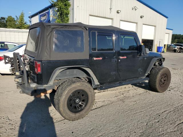 1J4BA3H1XBL506449 - 2011 JEEP WRANGLER U SPORT أسود صورة 3