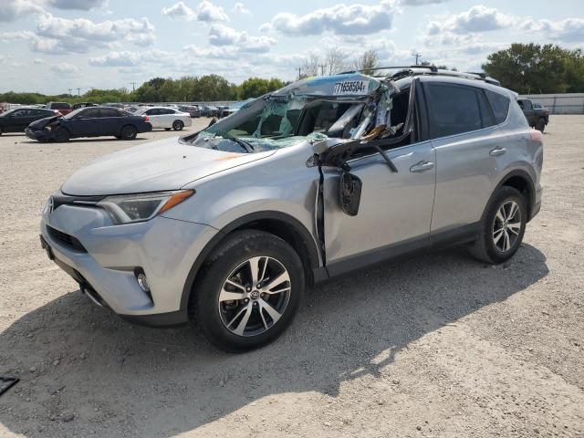 2T3WFREV9GW310607 - 2016 TOYOTA RAV4 XLE SILVER photo 1