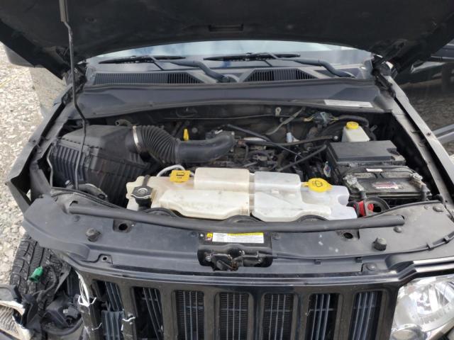 1C4PJMAK1CW105411 - 2012 JEEP LIBERTY SPORT BLACK photo 11