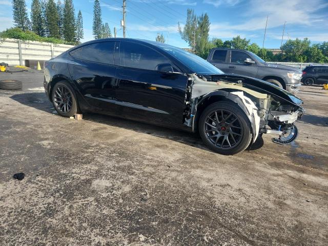 5YJ3E1EAXSF035378 - 2025 TESLA MODEL 3 BLACK photo 4