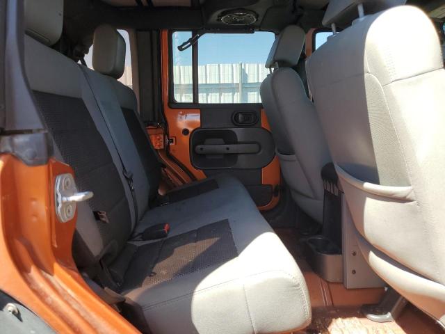 1J4BA3H19AL172820 - 2010 JEEP WRANGLER U SPORT Оранжевый фото 11