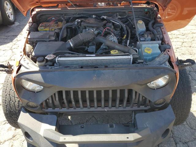1J4BA3H19AL172820 - 2010 JEEP WRANGLER U SPORT Оранжевый фото 12