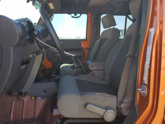 1J4BA3H19AL172820 - 2010 JEEP WRANGLER U SPORT Оранжевый фото 7