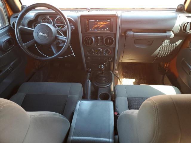 1J4BA3H19AL172820 - 2010 JEEP WRANGLER U SPORT Оранжевый фото 8