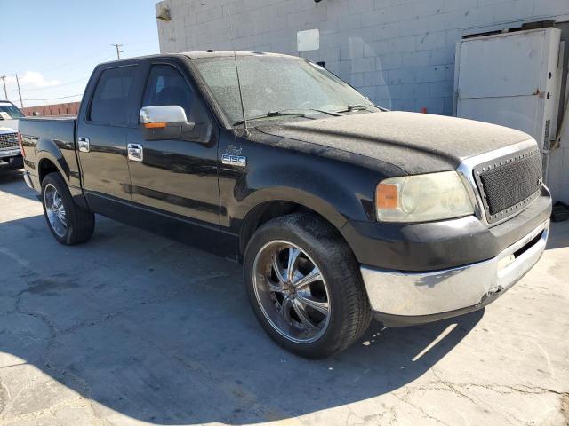 1FTPW12567FA19154 - 2007 FORD F150 SUPERCREW BLACK photo 4