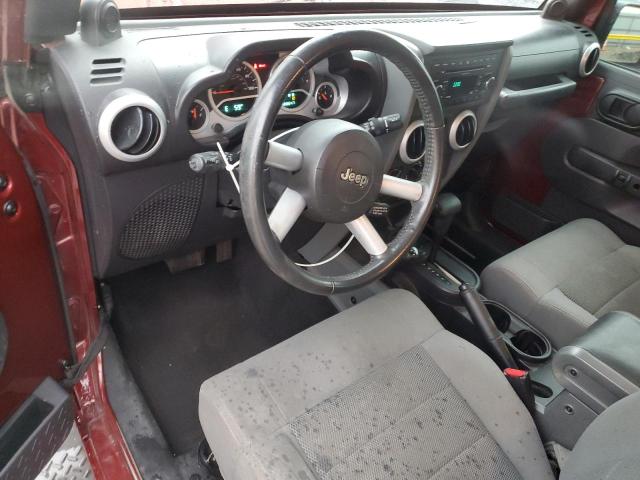 1J4GA59168L521572 - 2008 JEEP WRANGLER U SAHARA წითელი ფოტო 8