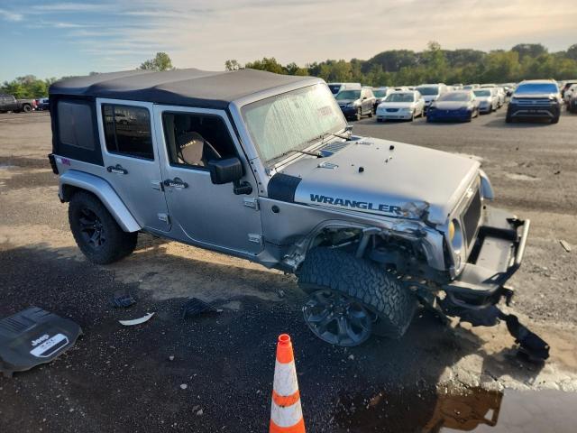 1C4BJWEG0DL586136 - 2013 JEEP WRANGLER U SAHARA SILVER photo 4