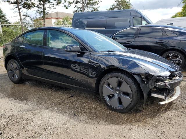 5YJ3E1EAXNF287572 - 2022 TESLA MODEL 3 შავი ფოტო 4