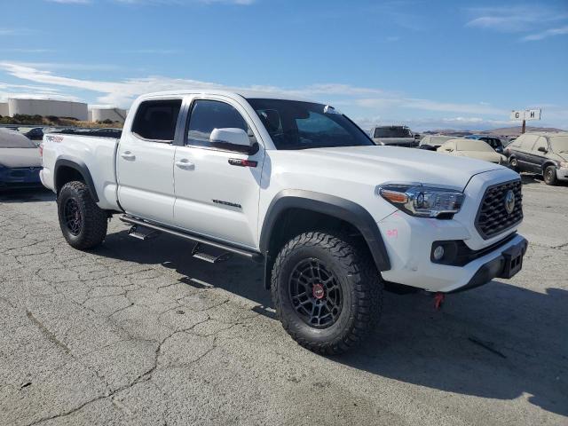 3TMDZ5BN8PM142567 - 2023 TOYOTA TACOMA DOUBLE CAB Beyaz fotoğraf 4