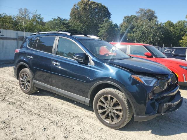 JTMDFREV6JJ199110 - 2018 TOYOTA RAV4 LIMITED BLUE photo 4