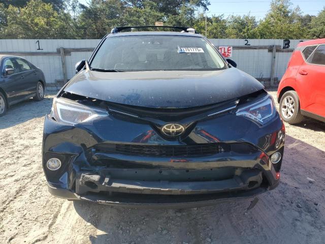 JTMDFREV6JJ199110 - 2018 TOYOTA RAV4 LIMITED BLUE photo 5