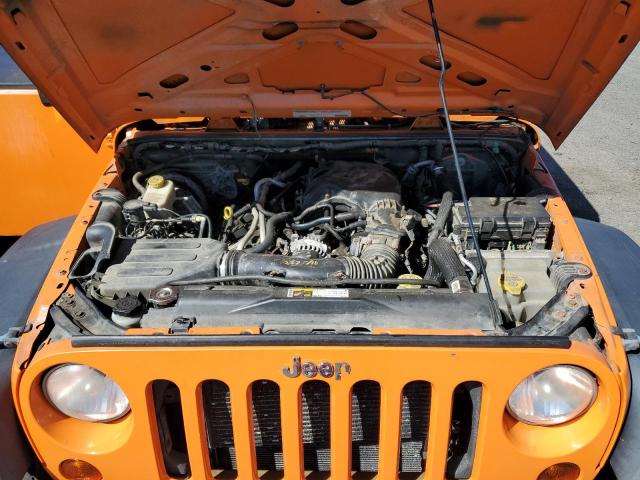 1C4BJWKGXCL220994 - 2012 JEEP WRANGLER U SPORT Оранжевый фото 11
