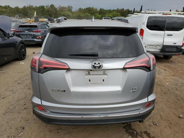 2T3BFREVXJW727062 - 2018 TOYOTA RAV4 LE SILVER photo 6