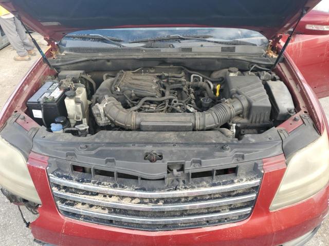 KNDJJ741X95018776 - 2009 KIA BORREGO LX RED photo 12