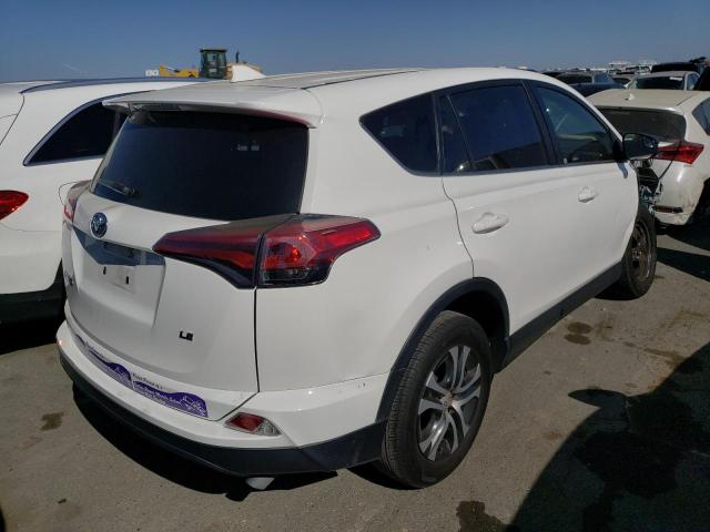 JTMZFREV8JJ734797 - 2018 TOYOTA RAV4 LE WHITE photo 3