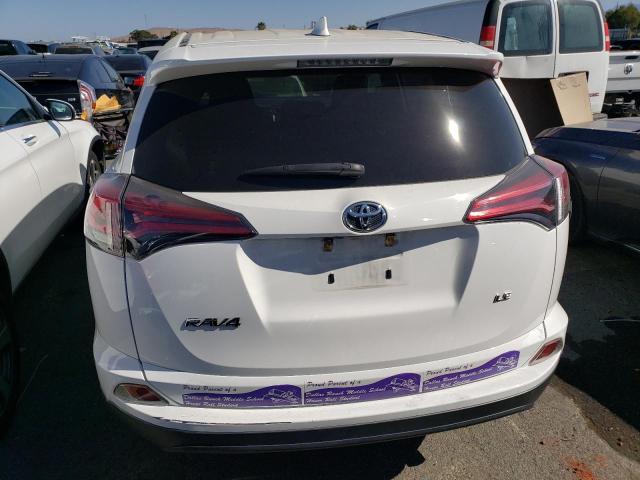 JTMZFREV8JJ734797 - 2018 TOYOTA RAV4 LE WHITE photo 6