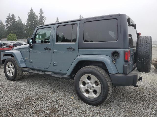 1C4BJWEG2EL171675 - 2014 JEEP WRANGLER U SAHARA GRAY photo 2