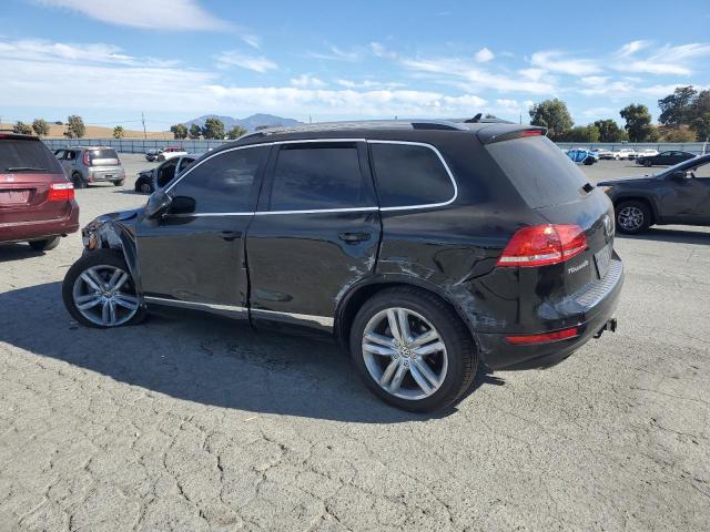 WVGEF9BP7CD009502 - 2012 VOLKSWAGEN TOUAREG V6 BLACK photo 2