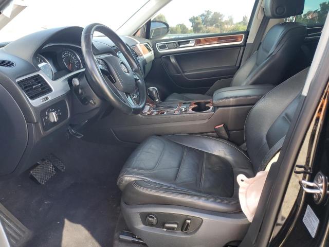WVGEF9BP7CD009502 - 2012 VOLKSWAGEN TOUAREG V6 BLACK photo 7