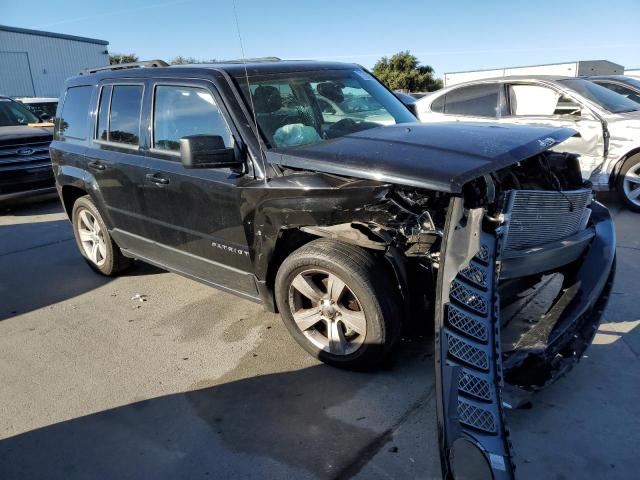 1C4NJPFA1GD794618 - 2016 JEEP PATRIOT LATITUDE BLACK photo 4