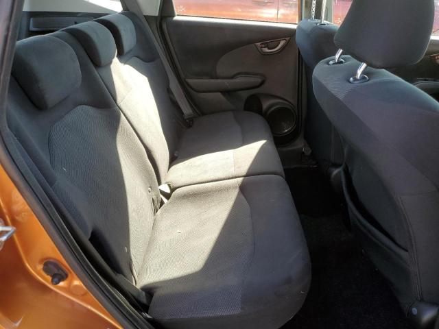 JHMGE884X9S075262 - 2009 HONDA FIT SPORT ORANGE photo 10
