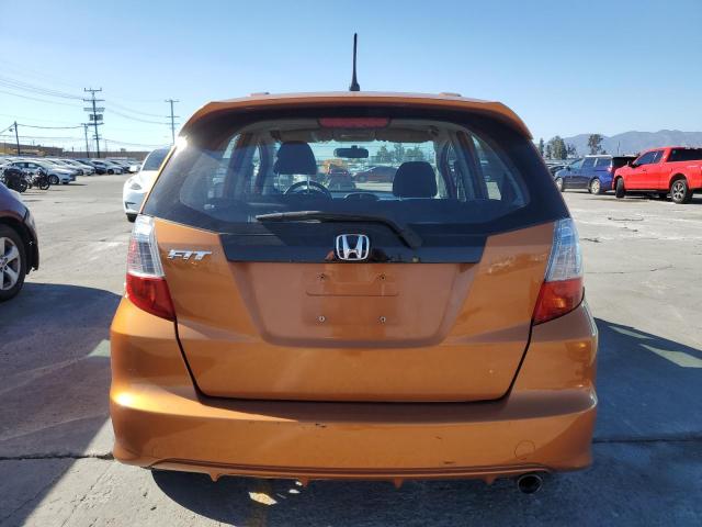 JHMGE884X9S075262 - 2009 HONDA FIT SPORT ORANGE photo 6