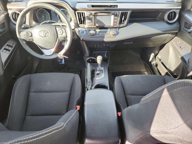 JTMRJREV5JD177988 - 2018 TOYOTA RAV4 HV LE Blau Foto 8