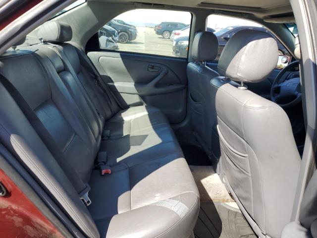 JT2BG22K9X0264433 - 1999 TOYOTA CAMRY LE RED photo 10