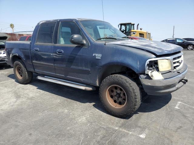 1FTRW07L63KB39399 - 2003 FORD F150 SUPERCREW BLUE photo 4