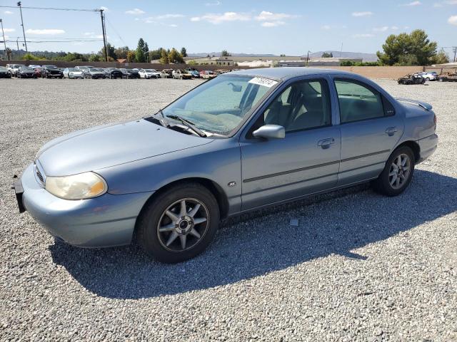 1FAFP66L8YK104588 - 2000 FORD CONTOUR SE BLUE photo 1