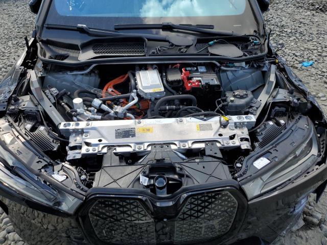 WB523CF04RCR88366 - 2024 BMW IX XDRIVE50 BLACK photo 12