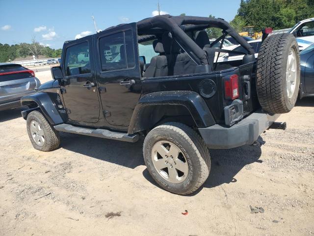 1C4BJWEG9CL169659 - 2012 JEEP WRANGLER U SAHARA შავი ფოტო 2