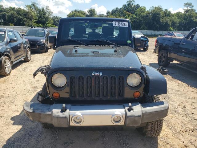 1C4BJWEG9CL169659 - 2012 JEEP WRANGLER U SAHARA შავი ფოტო 5