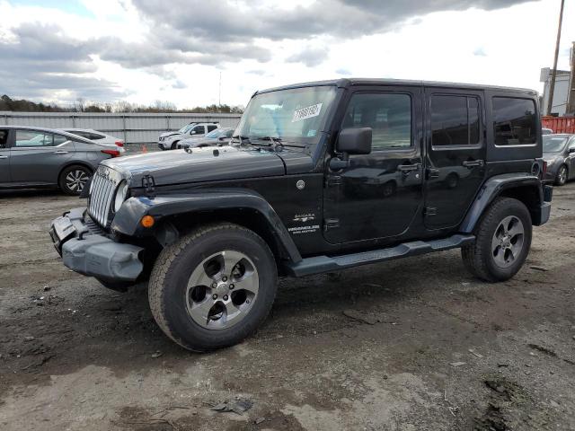 1C4BJWEG3GL172448 - 2016 JEEP WRANGLER U SAHARA BLACK photo 1