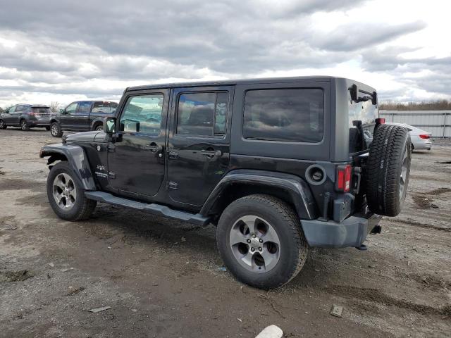 1C4BJWEG3GL172448 - 2016 JEEP WRANGLER U SAHARA BLACK photo 2
