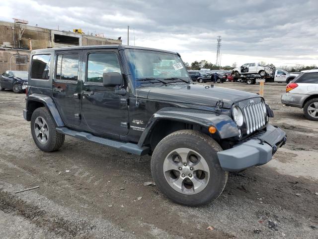 1C4BJWEG3GL172448 - 2016 JEEP WRANGLER U SAHARA BLACK photo 4