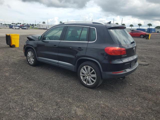 WVGAV7AX6CW559351 - 2012 VOLKSWAGEN TIGUAN S BLACK photo 2