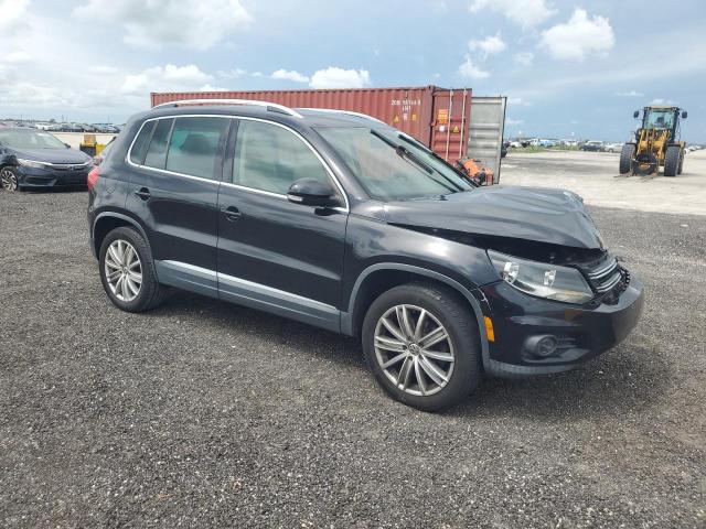 WVGAV7AX6CW559351 - 2012 VOLKSWAGEN TIGUAN S BLACK photo 4
