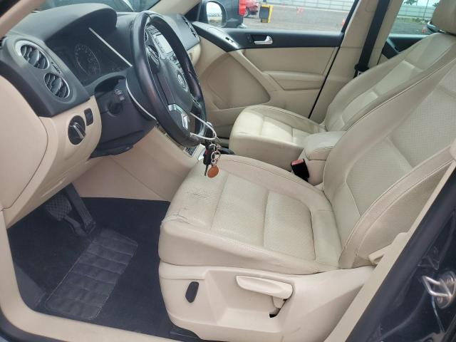 WVGAV7AX6CW559351 - 2012 VOLKSWAGEN TIGUAN S BLACK photo 7