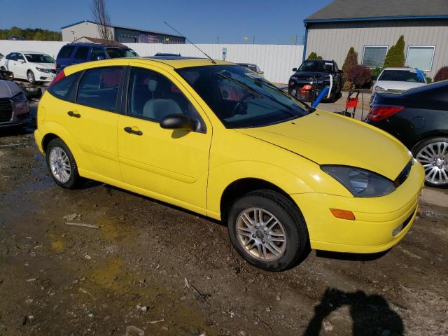 3FAFP37303R147775 - 2003 FORD FOCUS ZX5 YELLOW photo 4
