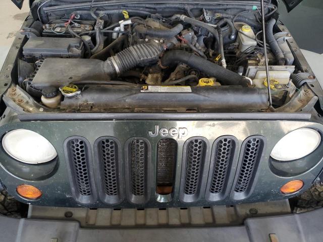 1J4BA3H19BL509858 - 2011 JEEP WRANGLER U SPORT أخضر صورة 12