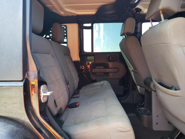 1J8GA59119L748734 - 2009 JEEP WRANGLER U SAHARA BLACK photo 10