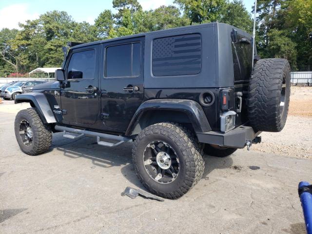 1J8GA59119L748734 - 2009 JEEP WRANGLER U SAHARA BLACK photo 2