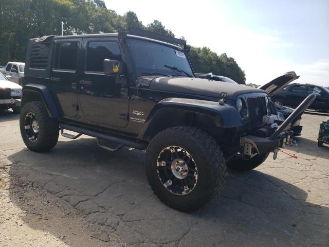 1J8GA59119L748734 - 2009 JEEP WRANGLER U SAHARA BLACK photo 4