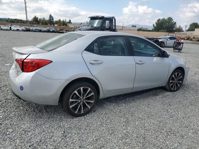 5YFBURHE8HP674559 - 2017 TOYOTA COROLLA L SILVER photo 3