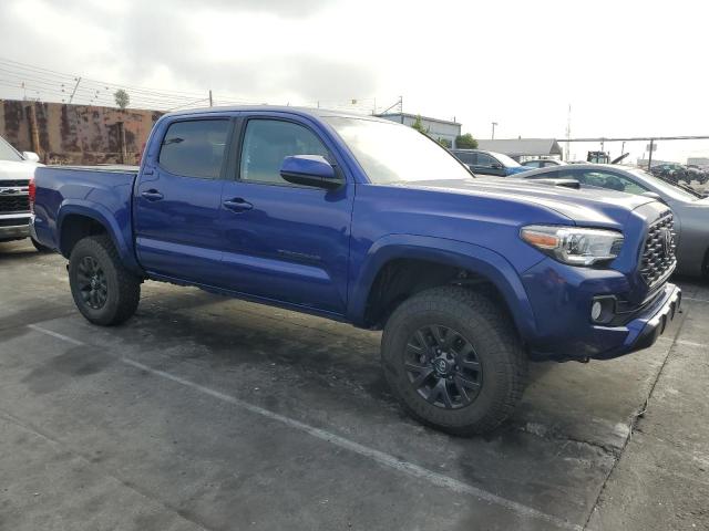3TMAZ5CN4NM179095 - 2022 TOYOTA TACOMA DOUBLE CAB BLUE photo 4