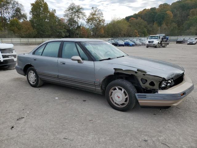 1G3HN52K9S4815423 - 1995 OLDSMOBILE 88 ROYALE GRAY photo 4