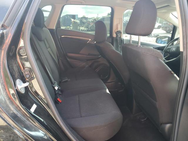 JHMGK5H79GS002320 - 2016 HONDA FIT EX Schwarz Foto 10