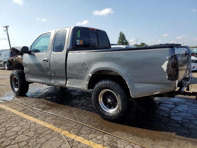 2FTRX18L9XCB20714 - 1999 FORD F150 Серый фото 2
